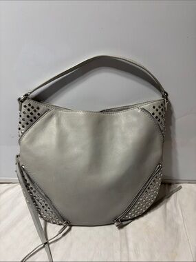 She+Lo Shoulder Bag with studs and tassel. EUC